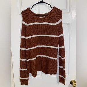 womens striped knit sweater with ruffle hem on the bottom!
